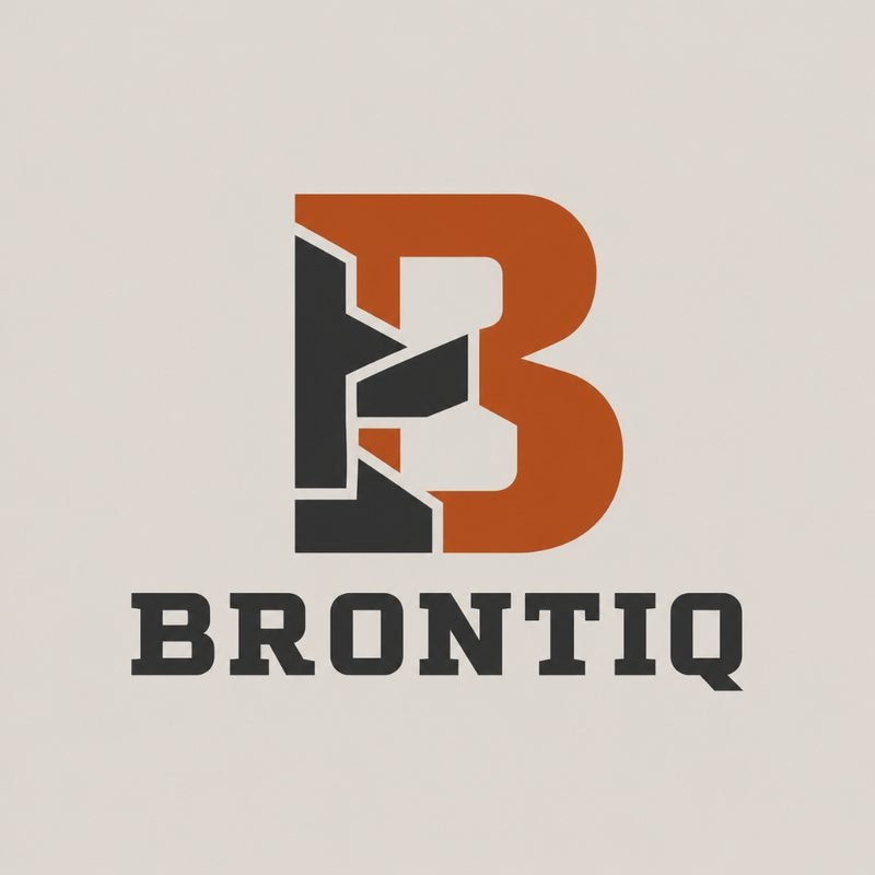 Brontiq identity concept: terracotta geometric B with charcoal mechanical overlay and slab-serif wordmark