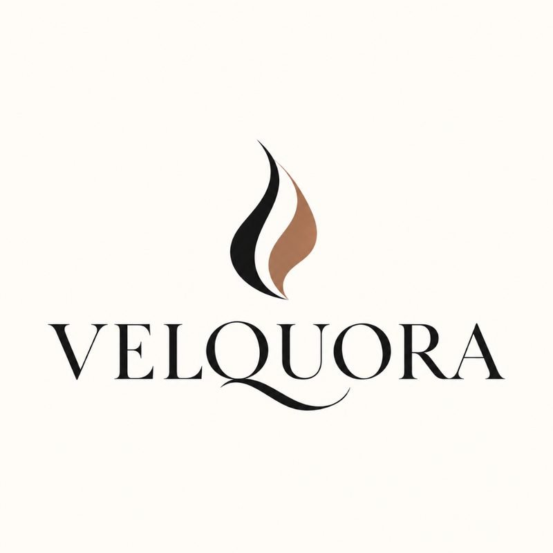 Velquora identity concept: split black and terracotta flame with elegant serif wordmark